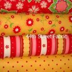 Delighted Fabric Red and Ye..